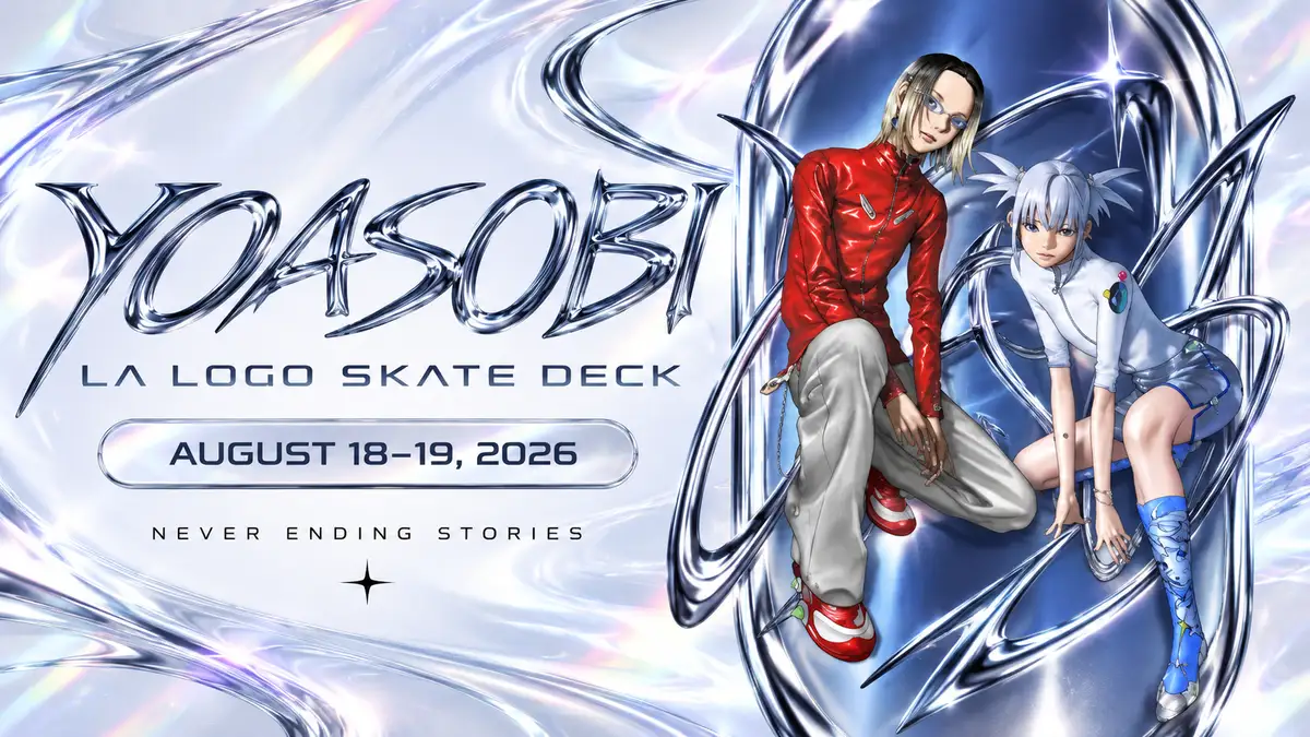 YOASOBI character duo with silver chrome artwork and complex merch lettering