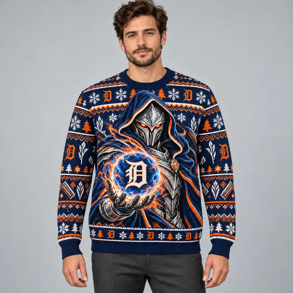 Editorial styling mockup of a model wearing the Detroit Tigers navy and orange Christmas sweater with silver armored figure and team orb