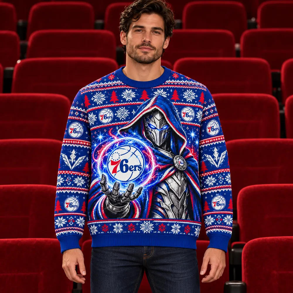 Editorial styling mockup of a model wearing the Philadelphia 76ers blue and red Christmas sweater with silver armored figure and team orb