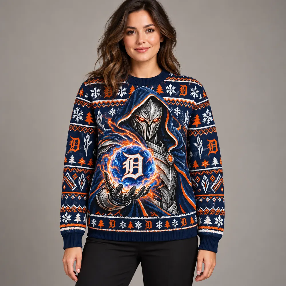 Editorial styling mockup of a model wearing the Detroit Tigers navy and orange Christmas sweater with silver armored figure and team orb